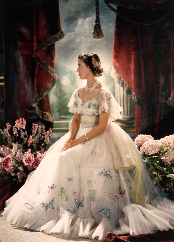 A Cecil Beaton portrait of Margaret on her 19th birthday reflects the romantic image of the royals at the time, with the Princess in a tulle gown decorated with butterflies