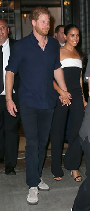 meghan markle wearing jumpsuit with prince harry