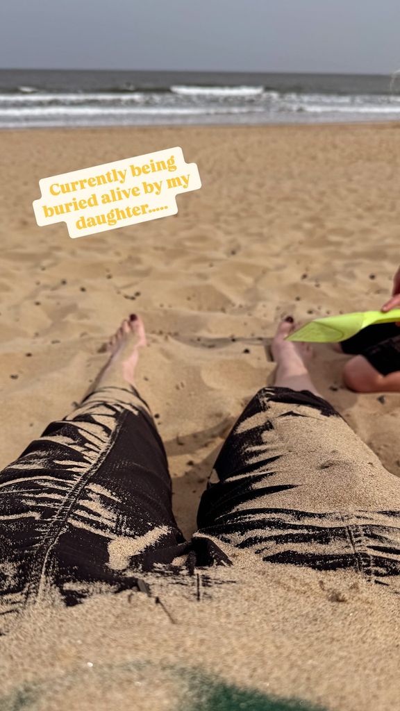 mother at beach with daughter