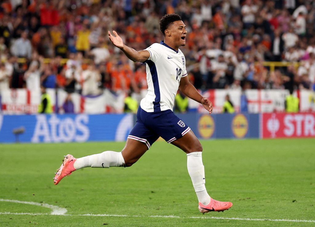 football player celebrating on pitch