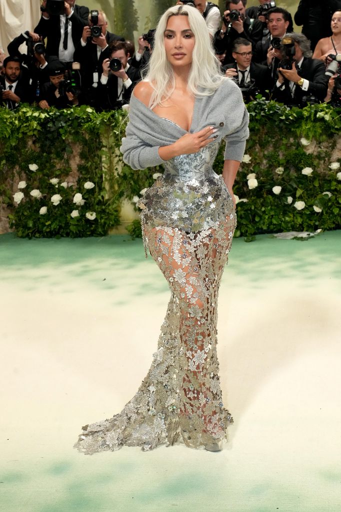 Kim Kardashian in silver dress and blonde hair at the 2024 Met Gala 