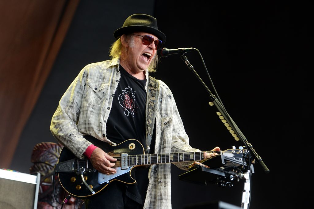 Neil Young performs on stage in Hyde Park on July 12, 2019 in London, England.