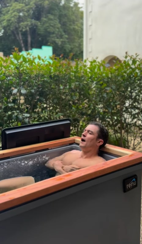 Orlando Bloom takes ice bath in garden of Montecito mansion