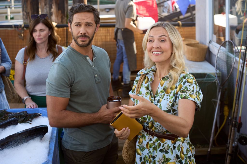 Michael Rady, Emilie Ullerup in a scene from Hallmark's new film Catch of the Day