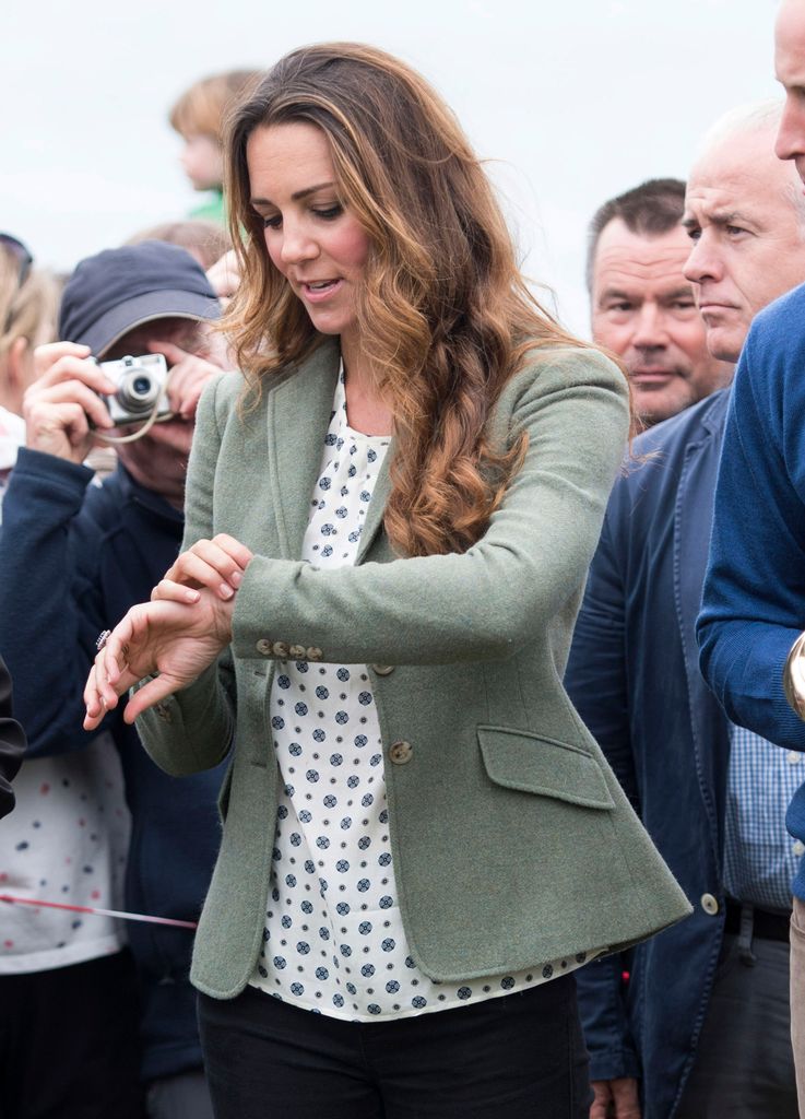 Kate's hair with highlights  looking at wrist