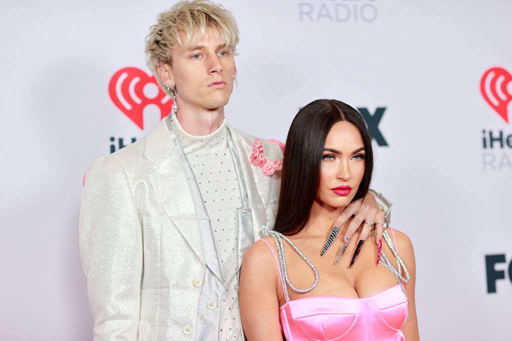 Machine Gun Kelly and Megan Fox attend the 2021 iHeartRadio Music Awards at The Dolby Theatre in Los Angeles, California, which was broadcast live on FOX on May 27, 2021