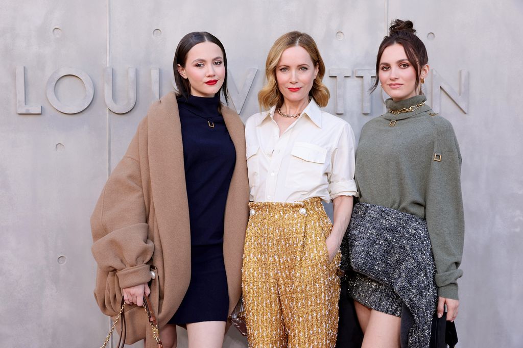 Iris Apatow, Leslie Mann, and Maude Apatow attend the Louis Vuitton's 2023 Cruise Show on May 12, 2022 