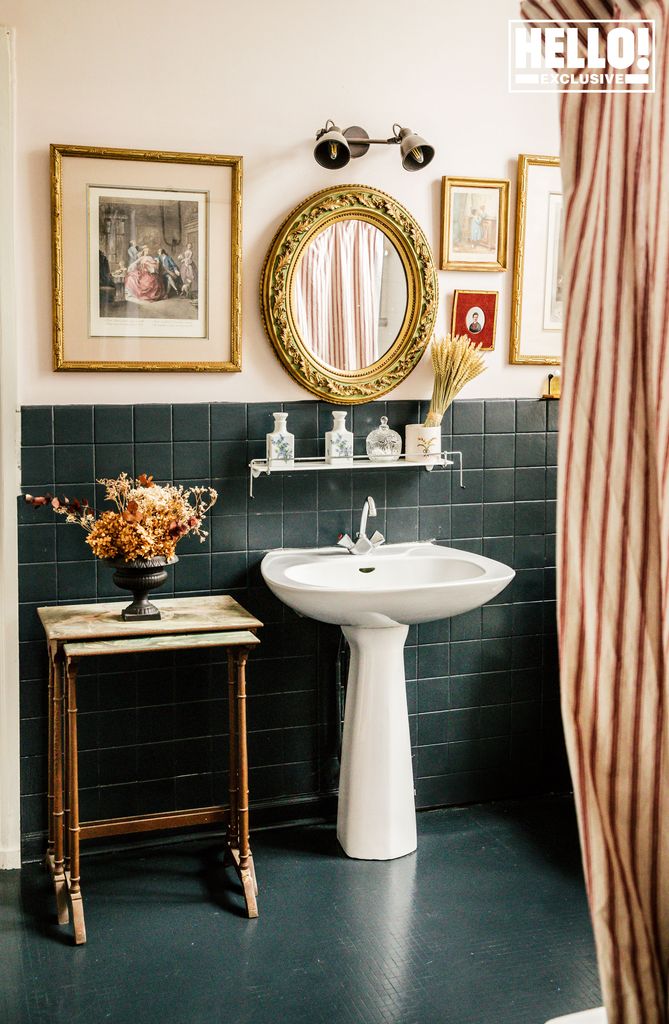 Catherine Roger's bathroom with dark tiles at Chateau Marcellus near Bordeaux