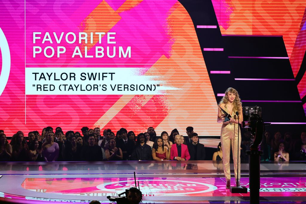 Taylor Swift accepts the Favorite Pop Album award for 'Red (Taylor's Version)' onstage during the 2022 American Music Awards at Microsoft Theater on November 20, 2022 in Los Angeles, California