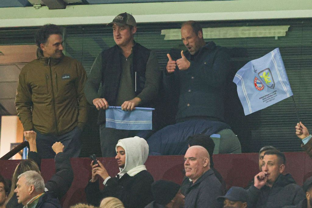 William gives thumbs up at football match