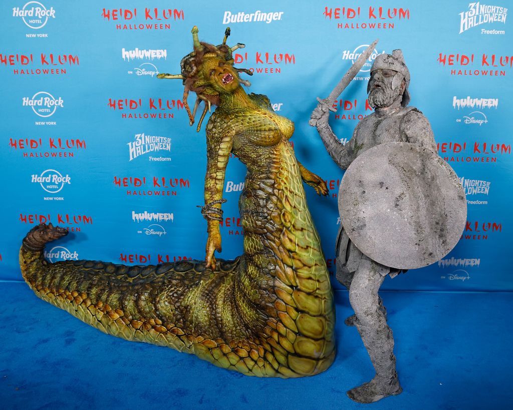 Heidi Klum dressed as Medusa and Tom Kaulitz as a stone at the model's annual Halloween party 