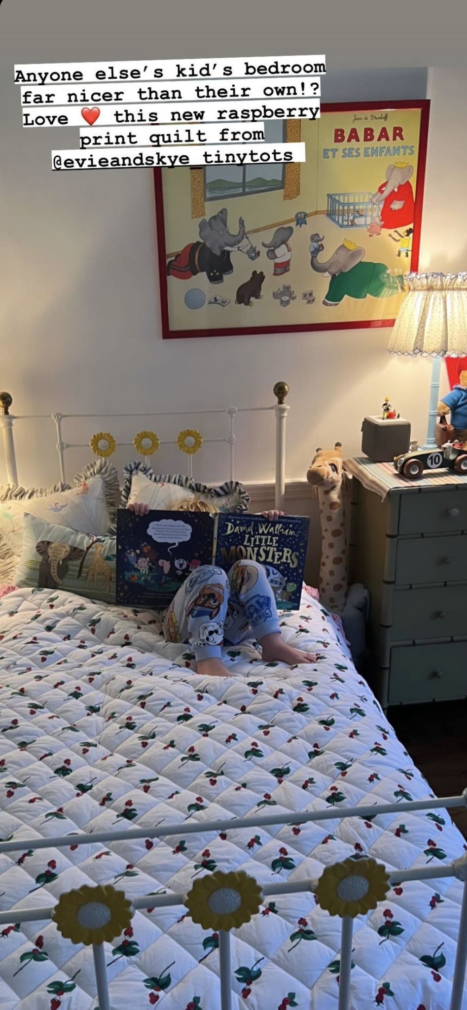 Wilfred Johnson reading a bedtime story in his room