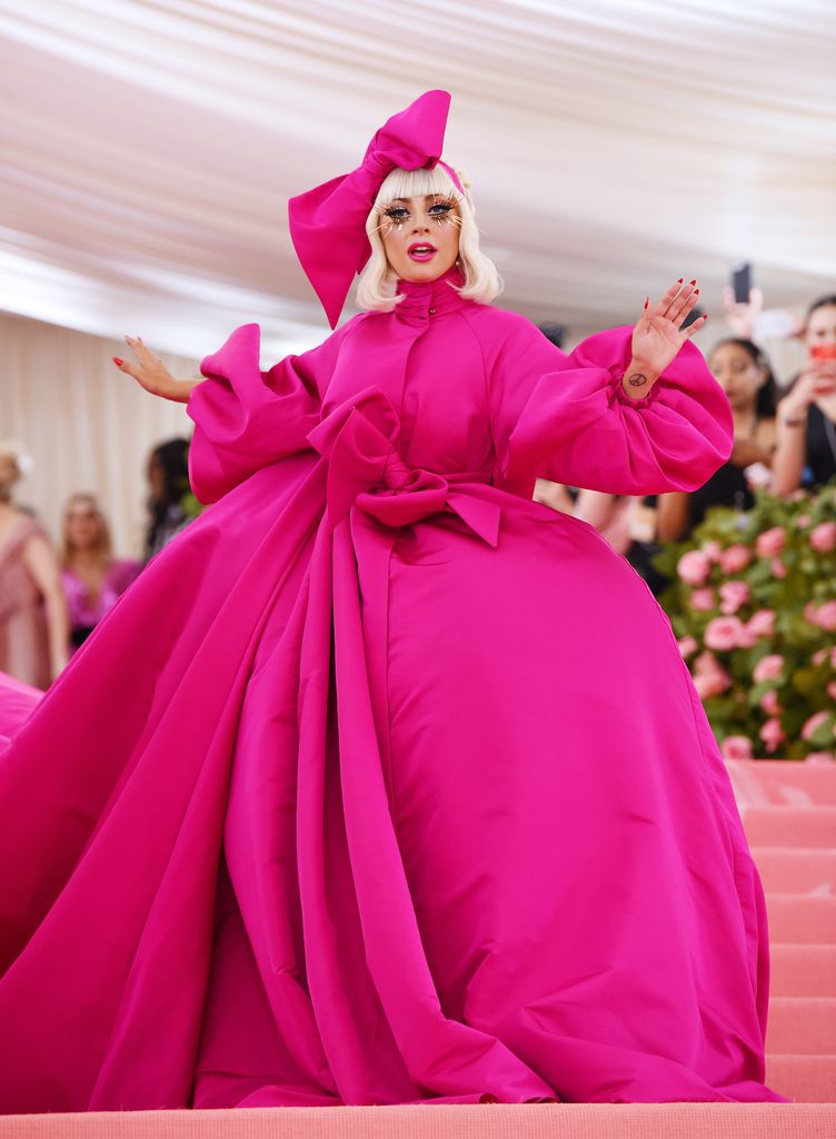 lady gaga in a hot pink outfit at the met gala in 2019