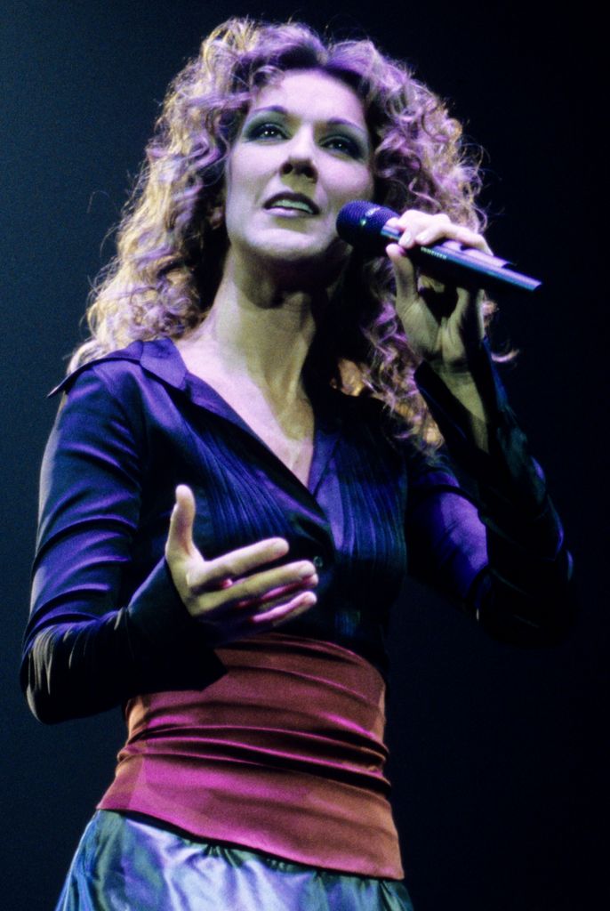 Céline looked so youthful with her tumbling curls