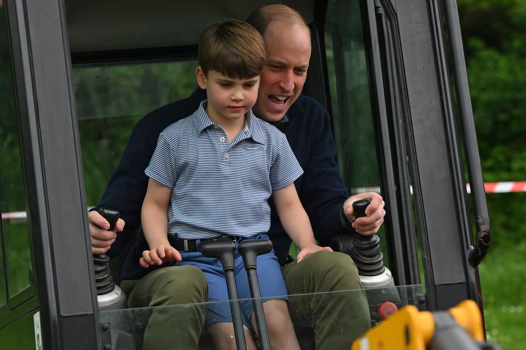 Prince Louis helps his dad Prince William to drive an excavator