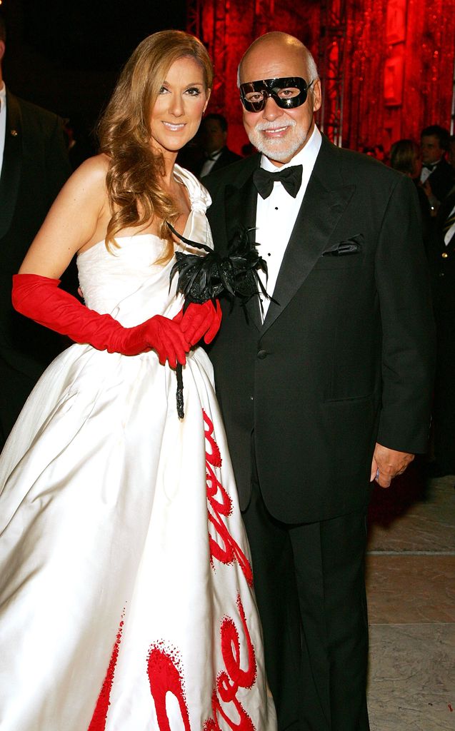 Singer Celine Dion (L) and her husband and manager Rene Angelil pose during a farewell masquerade themed party at Caesars Palace September 10, 2007 in Las Vegas, Nevada. Her show will close on December 15, 2007, after a nearly-five year sold out run.