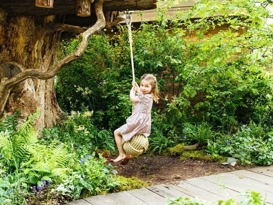 princess charlotte on swing at chelsea flower show