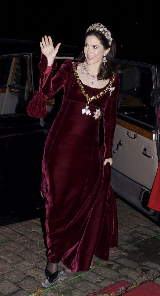 Crown Princess Mary in burgundy dress waving