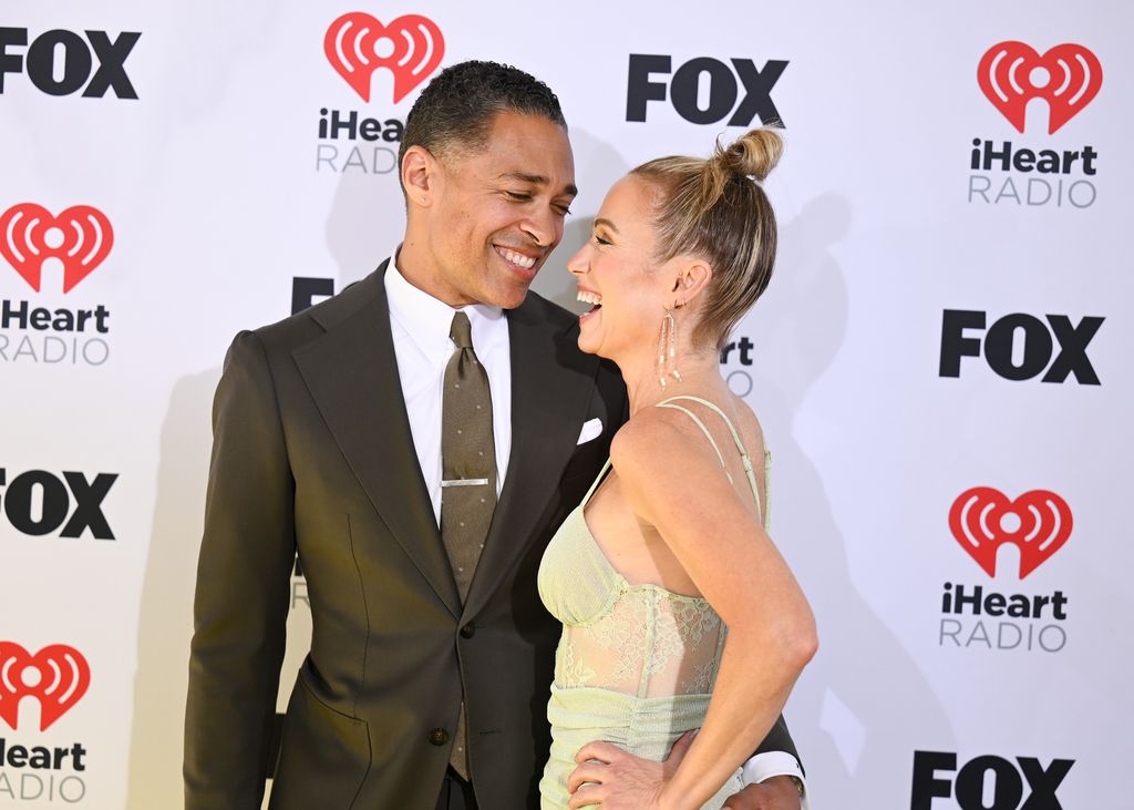 T. J. Holmes and Amy Robach at the 2024 iHeartRadio Music Awards held at the Dolby Theatre on April 1, 2024 in Los Angeles, California.