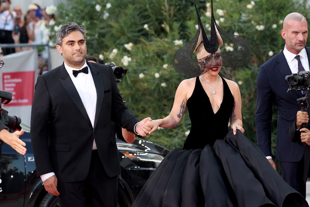 Lady Gaga and Michael Polansky attend the "Joker: Folie Ã  Deux" red carpet during the 81st Venice International Film Festival at Sala Grande on September 04, 2024 in Venice, Italy