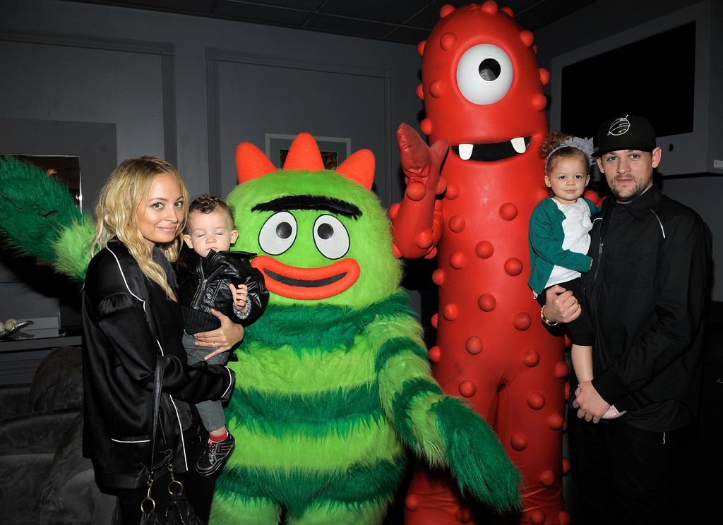 Nicole Richie, son Sparrow Madden, daughter Harlow Madden and husband musician Joel Madden pose with YO GABBA GABBA! characters backstage at YO GABBA GABBA! @ KIA PRESENTS YO GABBA GABBA! LIVE! THERE'S A PARTY IN MY CITY produced by S2BN Entertainment in 