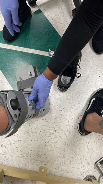 travis barker hospital broken toe medical boot
