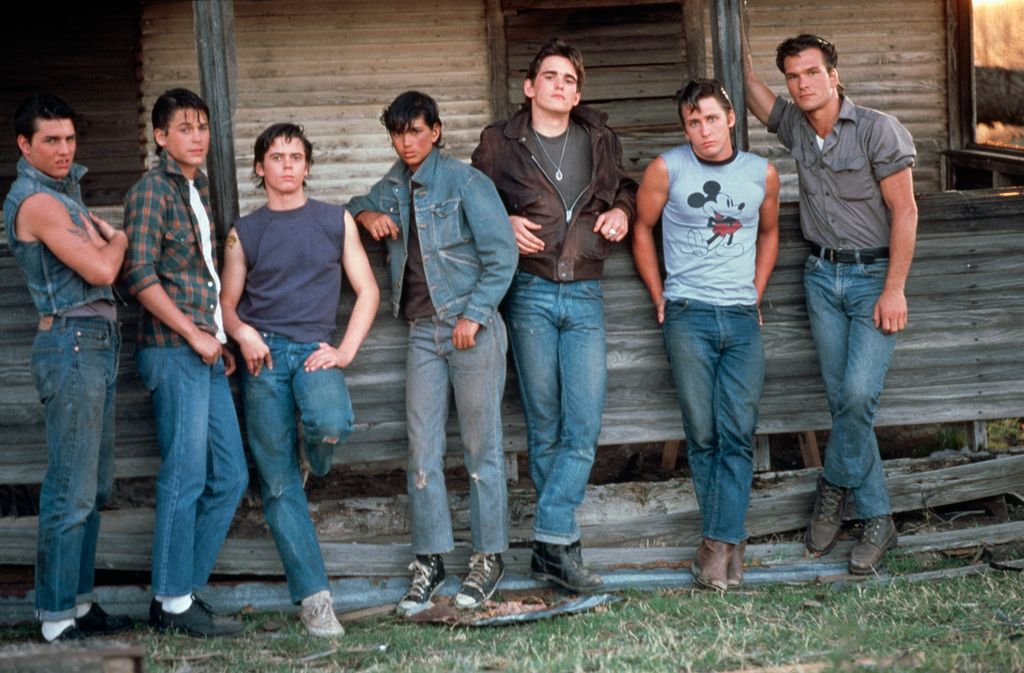 Tom Cruise, Rob Lowe, C. Thomas Howell, Ralph Macchio, Matt Dillon, Emilio Estevez and Patrick Swayze on the set of The Outsiders