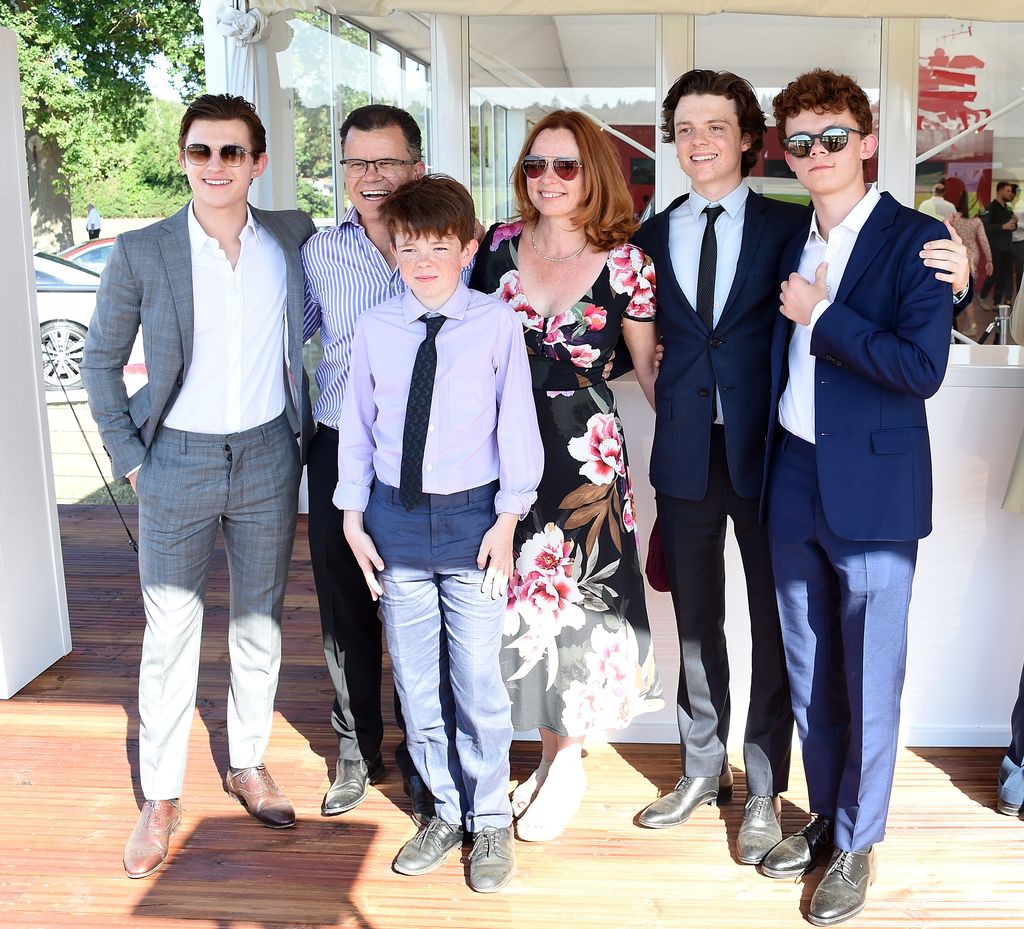 Tom Holland poses with his family Dominic Holland, Paddy Holland, Nicola Holland, Sam Holland and Harry Holland at the Audi Polo Challenge at Coworth Park Polo Club on June 30, 2018 in Ascot, England.