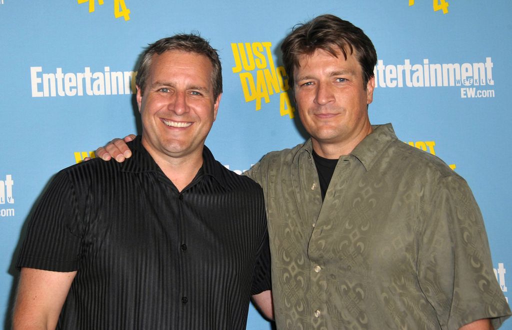 SAN DIEGO, CA - JULY 14:  Actor Nathan Fillion and brother Jeff Fillion arrive for Entertainment Weekly's Comic-Con Celebration held at Float at Hard Rock Hotel San Diego on July 14, 2012 in San Diego, California.  (Photo by Albert L. Ortega/Getty Images)