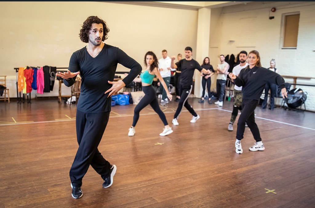 Graziano leading an ensemble of professional dancers in rehearsals