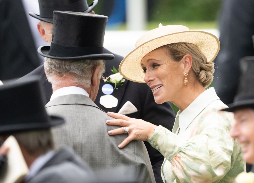 Zara Tindall greeting her grandfather King Charles at Ascot