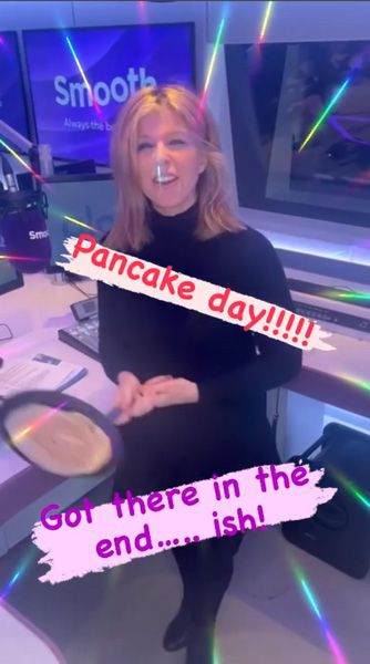 Kate Garraway flipping a pancake