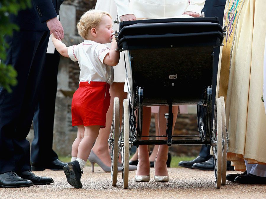 george taking a look at charlotte pram