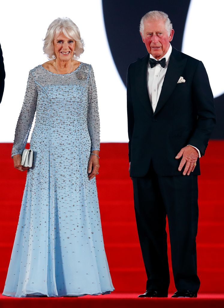 Queen Consort Camilla wearing a sky blue dress designed by Oldfield in 2021