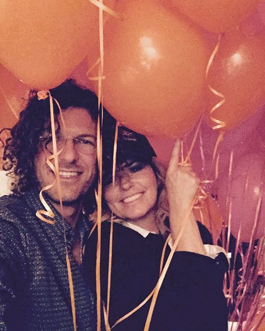 shania twain posing with husband frederic thiebaud and balloons