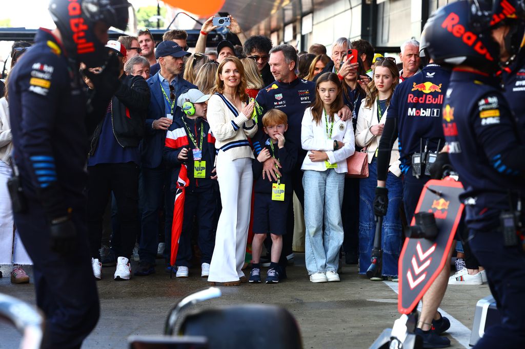 Oracle Red Bull Racing Team Principal Christian Horner shows family, Geri Horner, Montague Horner, Olivia Horner and Bluebell Halliwell the Oracle Red Bull Racing team practicing pitstops prior to the F1 Grand Prix of Great Britain at Silverstone Circuit 