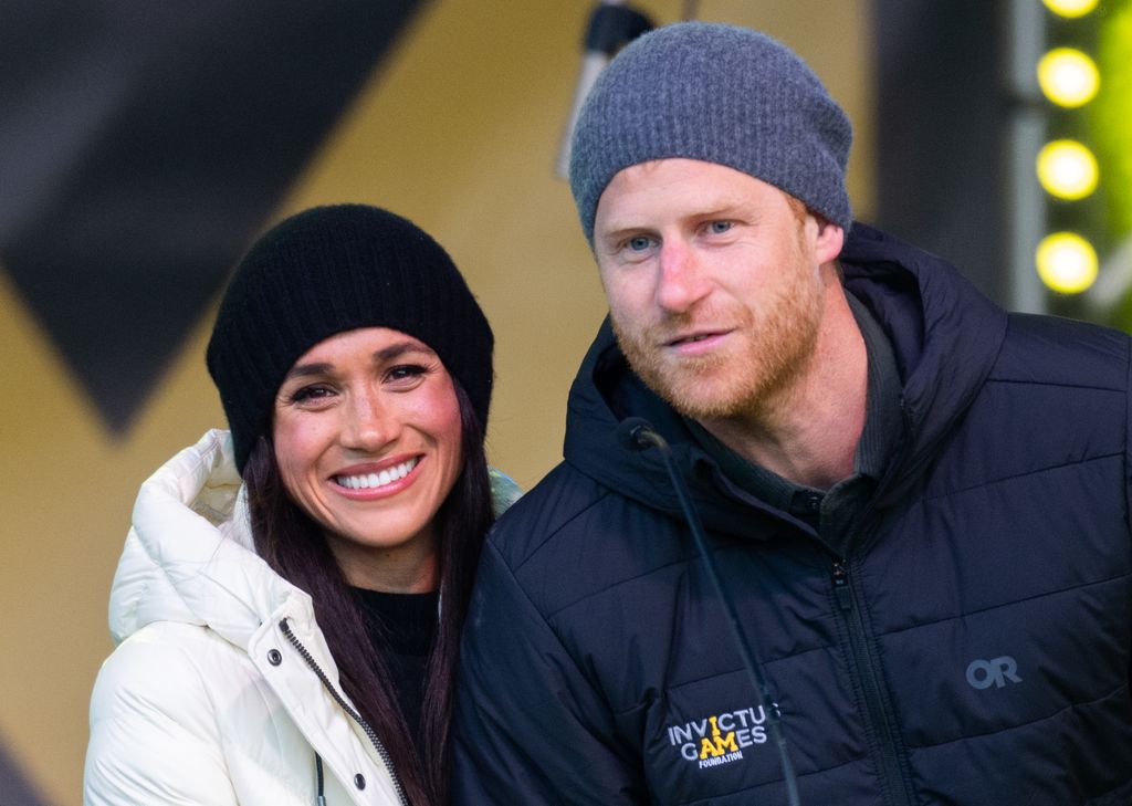 Meghan Markle and Prince Harry smiling together