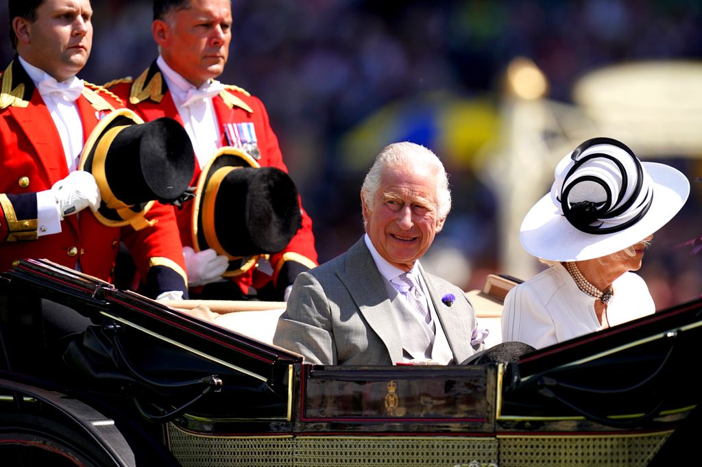 King Charles and Queen Camilla riding in a carriage on day four of Royal Ascot 