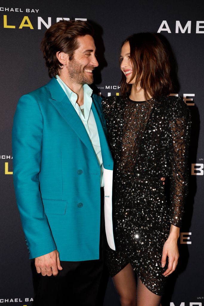 Jake Gyllenhaal and Jeanne Cadieu attend the Paris premiere Of "AMBULANCE" presented by Universal Pictures at Cinema UGC Normandie on March 20, 2022 in Paris, France