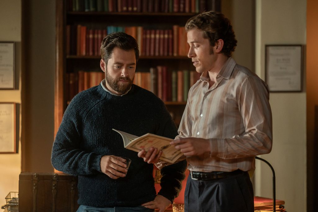 Will Cameron delves into Roger's library in Outlander