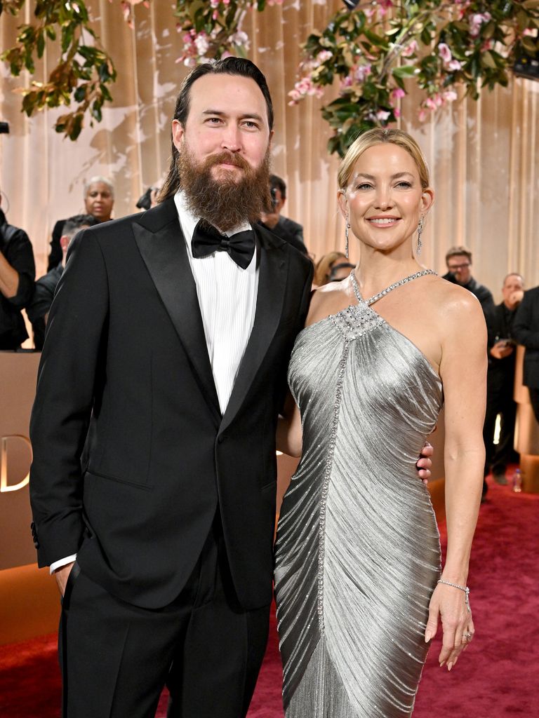 Danny Fujikawa and Kate Hudson attend the 83rd Annual Golden Globe Awards at The Beverly Hilton on January 11, 2026 in Beverly Hills, California.