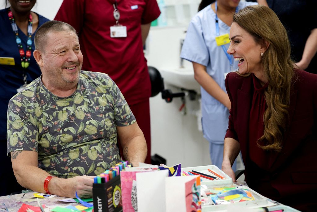 Princess of Wales, speaks to a patient during an arts workshop at Charing Cross Hospital in west London