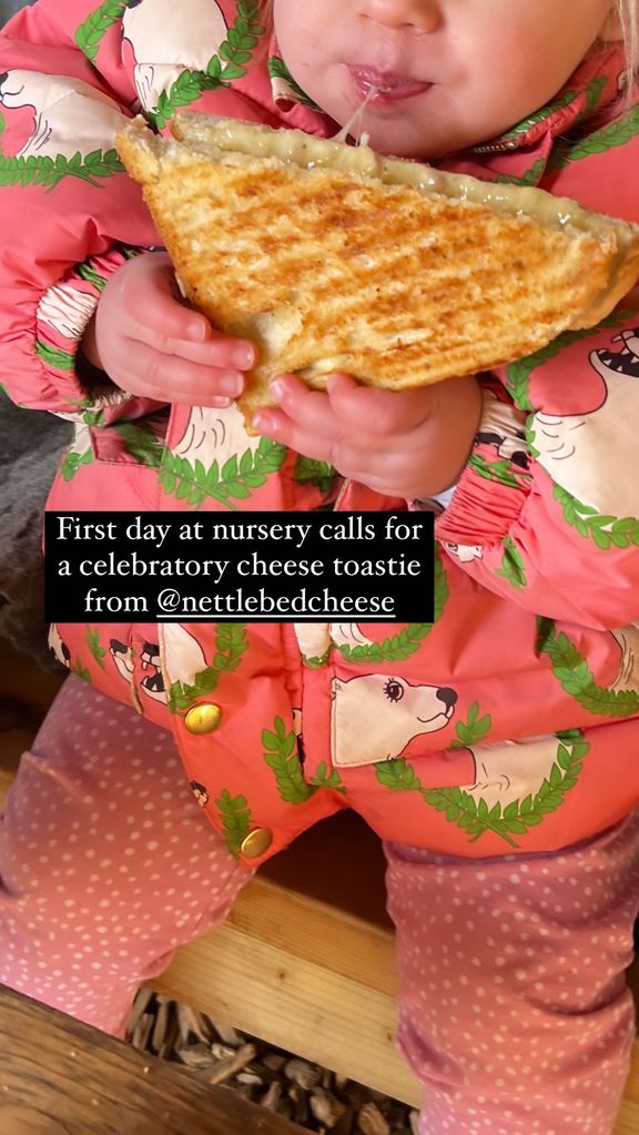 Carrie Johnson's daughter Romy eating a chreese toastie 