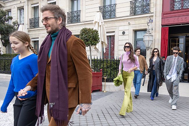 David and Victoria Beckham and their children and Nicola Peltz leaving their Paris hotel