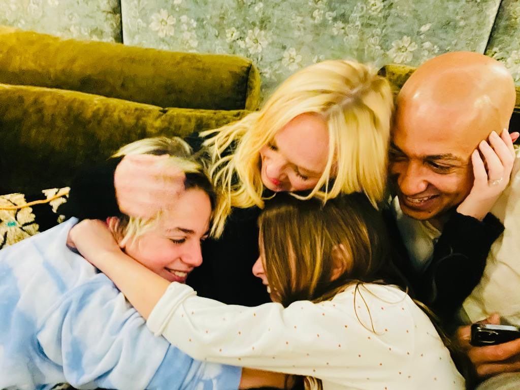 Emma Bunton hugging her husband Jade Jones and kids Tate and Beau