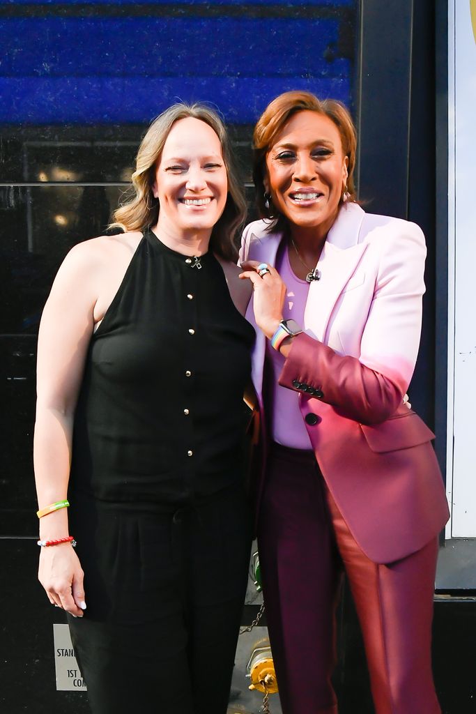 Robin and Amber smiling together at the GMA studios in 2022