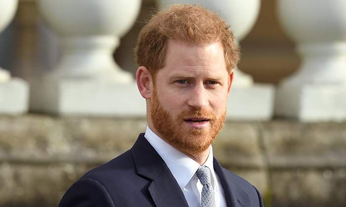 solo photo of prince harry looks solemn