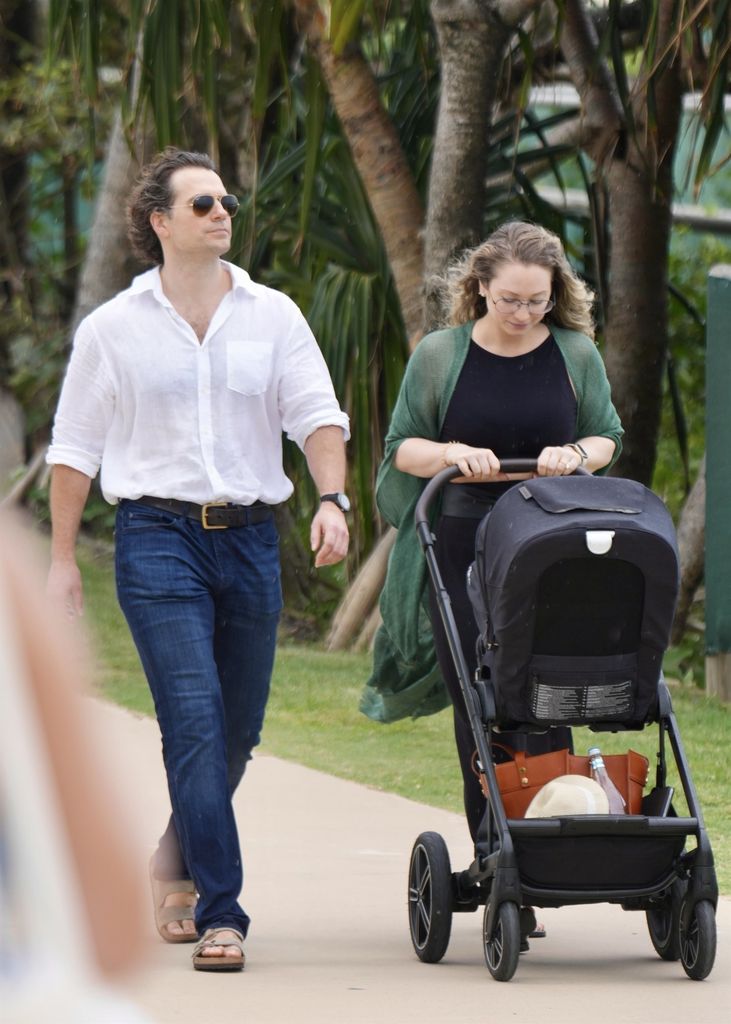 Henry Cavill and partner Natalie Viscuso spotted on the Gold Coast with baby taking a walk