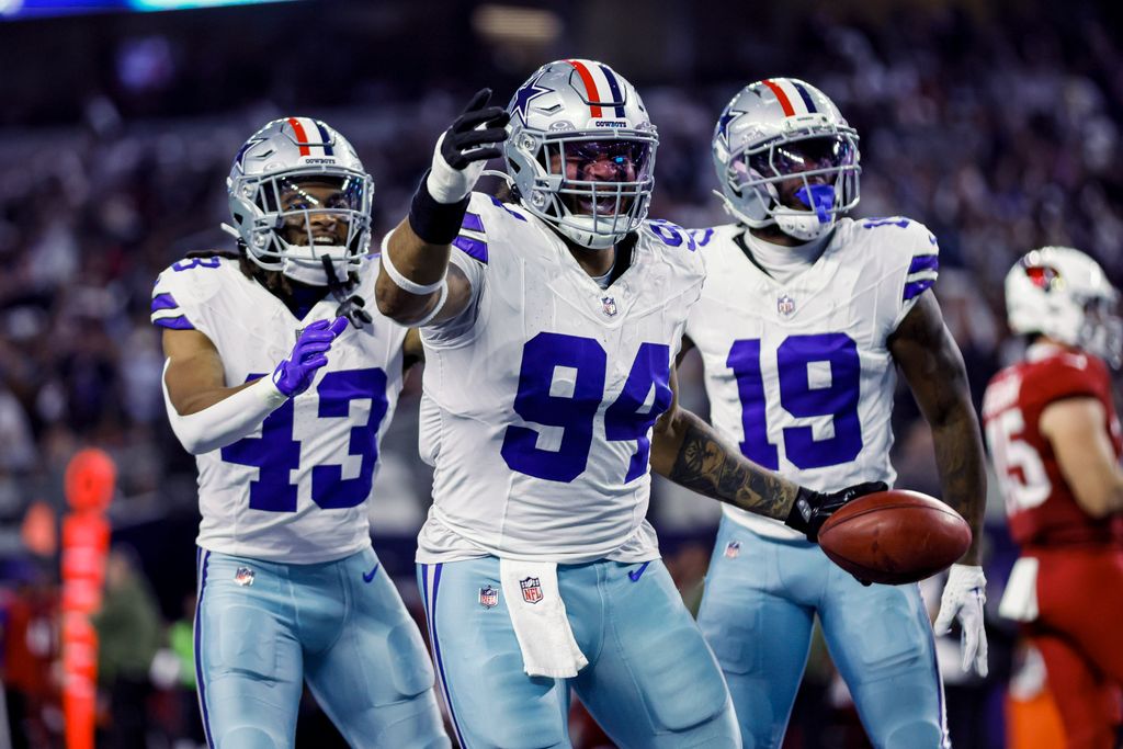 Dallas Cowboys defensive end Marshawn Kneeland (94) celebrates recovering a blocked punt for a touchdown 