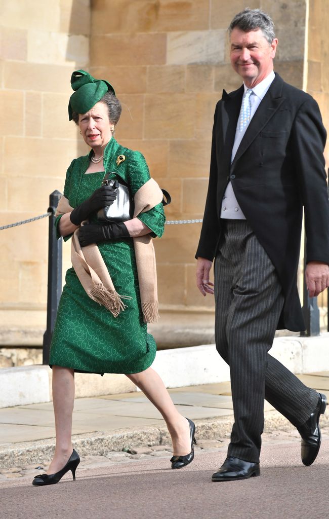 Princess Anne in a green dress with her husband Timothy Laurence at Princess Eugenie's wedding